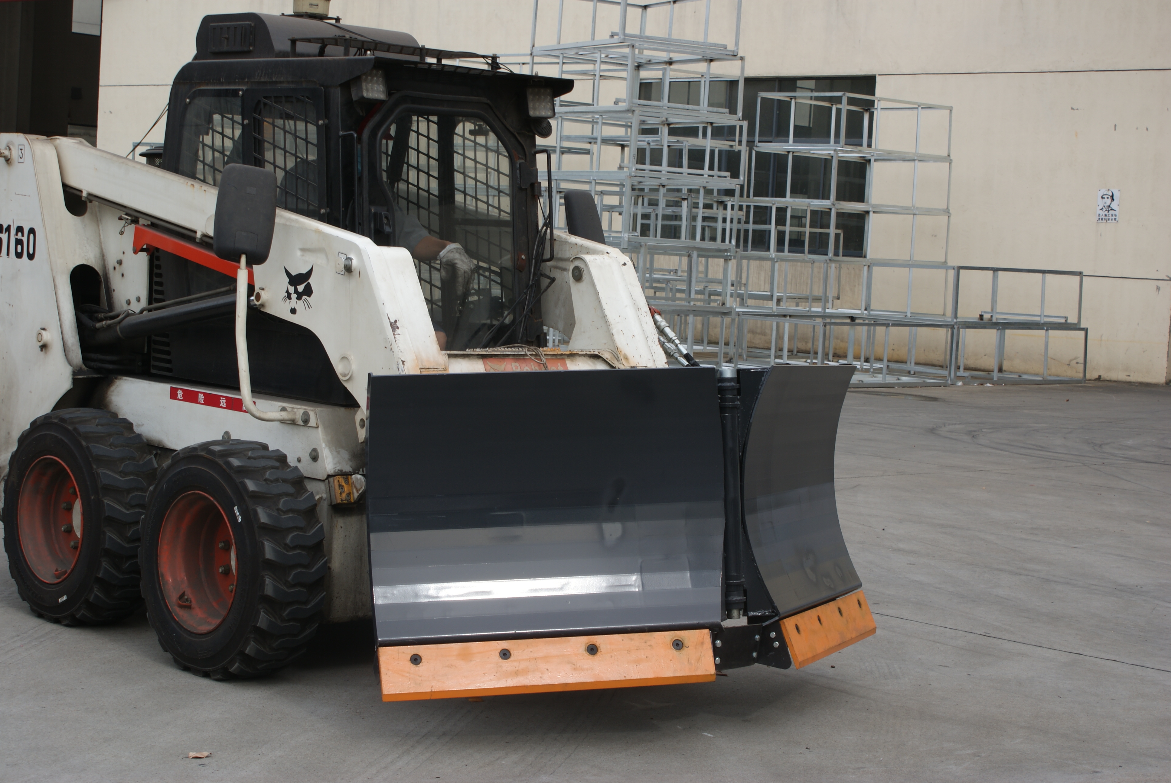 Improving Work Efficiency: Features and Functions of Skid Steer Attachment V-Snow Blade
